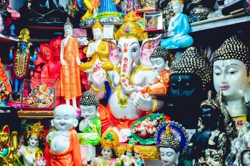 Hindu gods statues displayed in the market shop