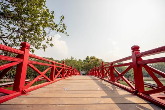 Beautiful view of green trees in the Huc Bridge in Hanoi Vietnam