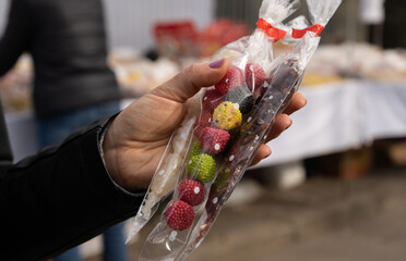 Traditional Polish candies from a stand with regional sweets in Kraków, such as miodek turecki, trupi miodek or pańska skórka. Treats sold during All Saints' Day and Easter Emaus in Krakow, Poland.