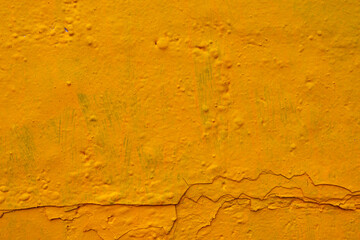 Yellow painted wall surface, abstract background for design.