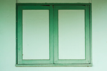 Old wooden green windows, texture and background.