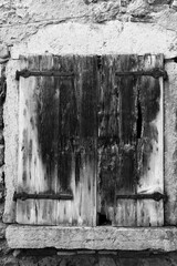 Monochrome shot of the wooden shutters