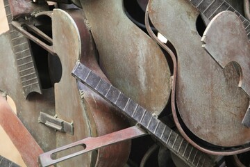 Closeup shot of guitars made of iron