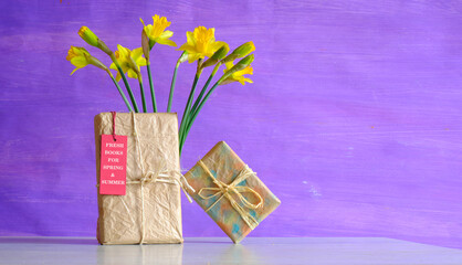 New book  releases for spring and summer, gift wrapped books, hang tag and flowers.Spring Book...