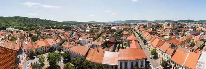 Panorama of the city of Bistrița  from a high point. Transylvania. Romania. - obrazy, fototapety, plakaty
