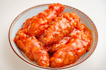 Lula kebab shish meat with tomato sauce close-up, selective focus