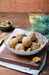 Walnut Energy Balls, Healthy Candies on Wooden Background