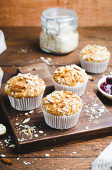 Muffins with Oat and Almond Topping, Rustic Background