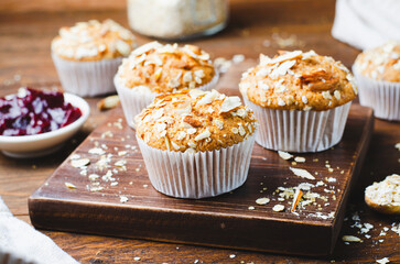 Muffins with Oat and Almond Topping, Rustic Background