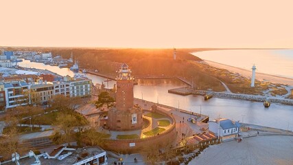 Harbour and lighthouse in Kolobrzeg. - obrazy, fototapety, plakaty