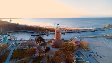 Harbour and lighthouse in Kolobrzeg. - obrazy, fototapety, plakaty