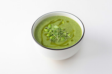 Cream soup with broccoli and spinach. Healthy food. Vegetarian soup. Healthy lifestyle. Lean menu. Isolated object. Photo on white background. Copy space.