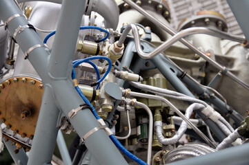 Rocket engine. Element for fastening pipelines for supplying fuel, coolant to the combustion...