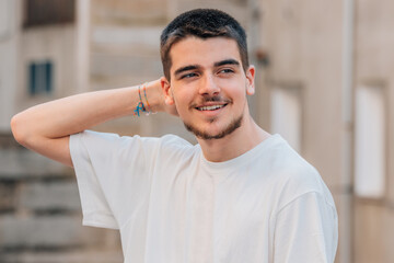 young teenager on the street smiling