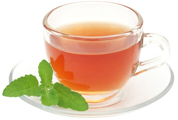Herbal tea in a cup with tulsi leaves - 579471726