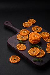 Dried round shape slices of bright orange color tangerine