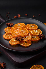 Dried round shape slices of bright orange color tangerine