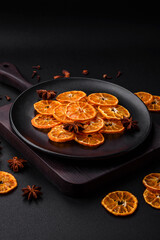 Dried round shape slices of bright orange color tangerine