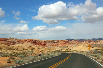 Fototapeta na wymiar The road and Rainbow Vista - Valley of Fire State Park, Nevada
