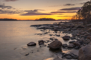 Summer landscape of the sunset over the sea in southern Finland.