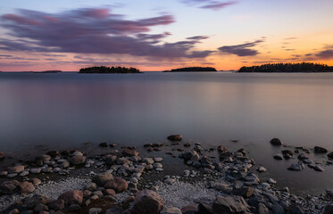 Twilight over the sea with long exposure time. Landscapes, Scandinavia, Finland.