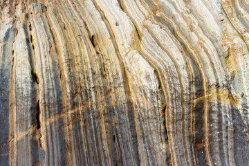 Obraz premium Layered Waterfall Shaped Sandy Rocks Background