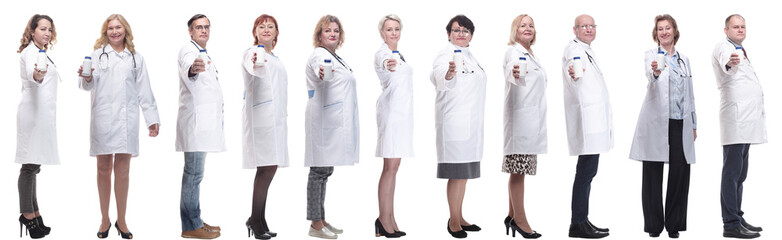 Fototapeta premium group of doctors holding jar isolated on white