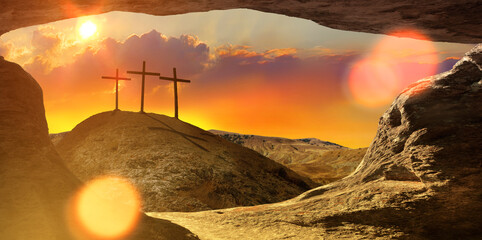 Three wooden crosses on a hill in the morning. Concept of Crucifixion on Mount Golgotha,...