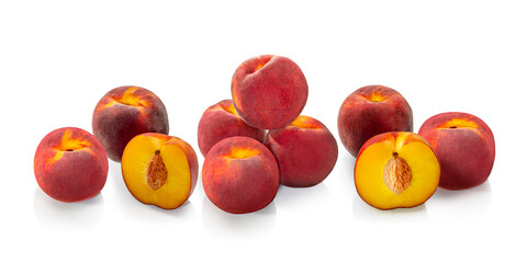 Peaches on a white isolated background. Ripe fresh tropical nectarine fruit piece with pit.