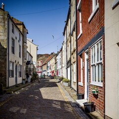 Fototapeta na wymiar narrow street in coastal summer town