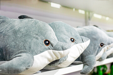 cute funny soft toy dolphins in the store. Ecology support