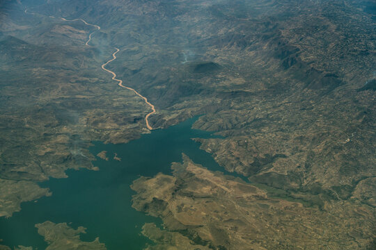 Aerial Landscape view of area around the "Gigel Gibe III Dam" on Oma River located in  southwest Ethiopia surrounded by mountains
