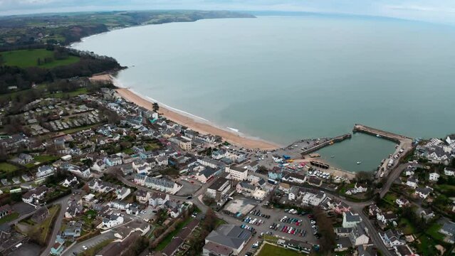 4k Aerial view of saundersfoot during winter months of the year 2023, Aerial view of harbour and beach with high tide