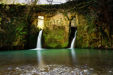Waterfalls over the ancient grindstone of Biedano gorges, Barberano Romano, Blera, Viterbo, Lazio, Italy - obrazy, fototapety, plakaty