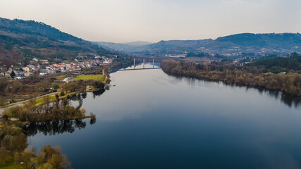 Aerial drone photography over the Mino river in the town of Barbantes in the province of Orense, in Galicia, Spain.