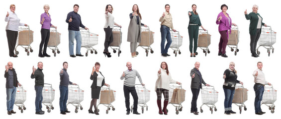 Obraz premium group of people with cart showing thumbs up