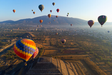Sunrise on hot air balloon over the Teotihuacan pyramid