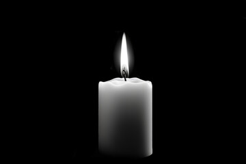 Fototapeta na wymiar Candle light with black background