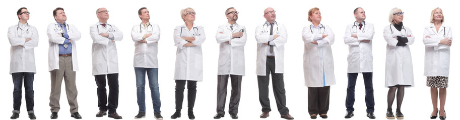 Fototapeta premium group of doctors standing in full length isolated on white