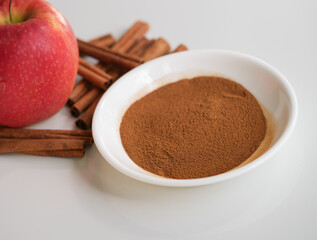 apple and cinnamon sticks  spice close up