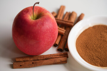 apple and cinnamon sticks  spice close up