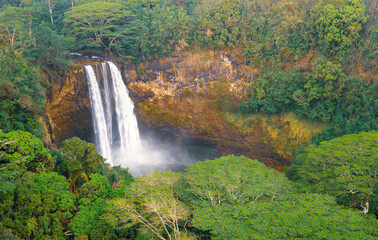 Drone photo of Waterfall in the jungle on Kaua’i 