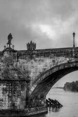 Foggy Charles bridge in black and white
