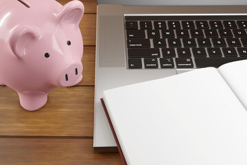 Blank notebook, a pink piggy bank and a laptop on a wooden table. Illustration of the concept of financial planning