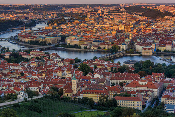 Fototapeta na wymiar Prague's twilight skyline with the Charles Bridge and the Vltava River