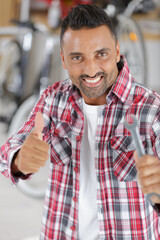 cyclist smiling with thumb up