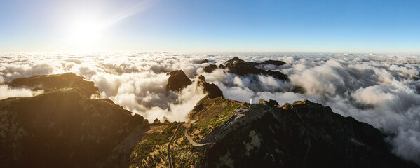 Peaks of mountains over the clouds. Madeira pinnacles panorama. Top view.