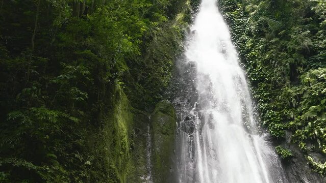 Top view of Jungle Waterfall in slow motion. Pulang-Tubig Falls. Negros, Philippines.