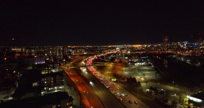 Aerial view of Cars Driving Down the Interstate at Night in Denver, Colorado