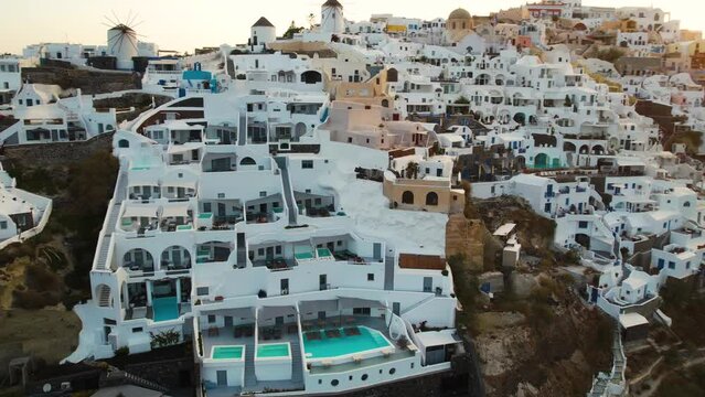 Aerial View of Luxury Resort on Santorini Island, Greece, White Buildings and Private Swimming Pools